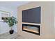 Electric fireplace with built-in media console at 17407 N 130Th Dr, Sun City West, AZ 85375
