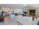 Open concept living area with kitchen and dining views at 17407 N 130Th Dr, Sun City West, AZ 85375