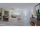 Spacious living area with wood-look floors and fireplace at 17407 N 130Th Dr, Sun City West, AZ 85375
