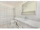 Bathroom with shower, tub, toilet and sink at 1673 W Hazelwood St, Phoenix, AZ 85015