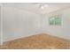 This bedroom features hardwood floors, a ceiling fan, and one window at 1673 W Hazelwood St, Phoenix, AZ 85015