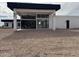 Modern home exterior with large glass windows and open patio space at 3525 S Kings Ranch Ct # 4, Gold Canyon, AZ 85118