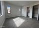 Bedroom featuring neutral walls, tile floors, and backyard views at 3525 S Kings Ranch Ct # 4, Gold Canyon, AZ 85118