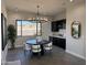 Elegant dining room with a round table and chandelier at 3525 S Kings Ranch Ct # 4, Gold Canyon, AZ 85118