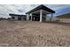 Modern home featuring a covered patio and mountain views on a sunny day at 3525 S Kings Ranch Ct # 4, Gold Canyon, AZ 85118