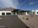 Stunning modern home featuring a black and white design, desert landscaping, and a mountain view at 3525 S Kings Ranch Ct # 4, Gold Canyon, AZ 85118