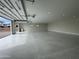 Spacious garage with epoxy floors, bright lighting, and ample parking at 3525 S Kings Ranch Ct # 4, Gold Canyon, AZ 85118