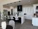 Contemporary kitchen with white cabinets, marble countertops, and a large island at 3525 S Kings Ranch Ct # 4, Gold Canyon, AZ 85118