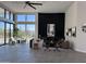 Open concept living room with a modern fireplace and large windows at 3525 S Kings Ranch Ct # 4, Gold Canyon, AZ 85118