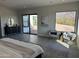 Main bedroom features sliding glass doors to a patio at 3525 S Kings Ranch Ct # 4, Gold Canyon, AZ 85118