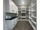 Walk-in pantry with custom shelving, countertop space, drawers, and tile floors at 3525 S Kings Ranch Ct # 4, Gold Canyon, AZ 85118