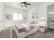 Serene bedroom with a plush rug, and a well-lit, airy space at 31712 N 169Th Ave, Surprise, AZ 85387