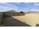 Large gravel backyard with block wall and mountain views at 12200 E Chevelon Trl, Gold Canyon, AZ 85118