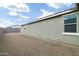 Home with backyard; view of gravel yard and wall at 12200 E Chevelon Trl, Gold Canyon, AZ 85118