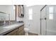 Clean bathroom with modern vanity and walk-in shower at 724 Emerald Dr, Apache Junction, AZ 85119