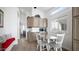 Cozy dining area with round table and four chairs, near kitchen at 724 Emerald Dr, Apache Junction, AZ 85119