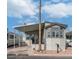 Nice manufactured home with carport and landscaping at 724 Emerald Dr, Apache Junction, AZ 85119