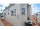Side view of a light beige mobile home with windows and AC unit at 724 Emerald Dr, Apache Junction, AZ 85119