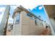 Exterior view of a light beige mobile home with multiple windows at 724 Emerald Dr, Apache Junction, AZ 85119