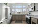 Modern kitchen featuring stainless steel appliances and corner sink at 724 Emerald Dr, Apache Junction, AZ 85119