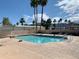 Refreshing community pool with volleyball net at 724 Emerald Dr, Apache Junction, AZ 85119