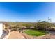 Landscaped backyard with mountain views and artificial turf at 9025 N Flying Butte --, Fountain Hills, AZ 85268