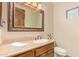 Bathroom with wood vanity, single sink, and decorative mirror at 9025 N Flying Butte --, Fountain Hills, AZ 85268