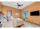 Bedroom with ceiling fan, large window and en-suite bathroom at 9025 N Flying Butte --, Fountain Hills, AZ 85268