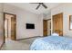Bedroom with wood doors and en-suite bathroom at 9025 N Flying Butte --, Fountain Hills, AZ 85268