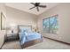 Bedroom with wood bed frame and large window at 9025 N Flying Butte --, Fountain Hills, AZ 85268