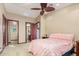 Cozy bedroom with ceiling fan and access to bathroom and laundry at 9025 N Flying Butte --, Fountain Hills, AZ 85268