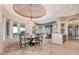 Elegant dining room with a beautiful chandelier and large windows at 9025 N Flying Butte --, Fountain Hills, AZ 85268