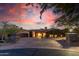 Stunning desert home with a large courtyard and 3-car garage at sunset at 9025 N Flying Butte --, Fountain Hills, AZ 85268
