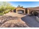 Luxury home with a paved driveway and mature trees at 9025 N Flying Butte --, Fountain Hills, AZ 85268