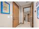 Long hallway with wood doors and carpeted floor at 9025 N Flying Butte --, Fountain Hills, AZ 85268