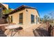 Exterior view of a tan house with a patio and landscaping at 9025 N Flying Butte --, Fountain Hills, AZ 85268