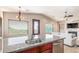 Island kitchen features granite countertops, stainless steel appliances, and scenic views at 9025 N Flying Butte --, Fountain Hills, AZ 85268