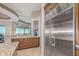 Kitchen features granite countertops, stainless steel refrigerator, and custom wood cabinets at 9025 N Flying Butte --, Fountain Hills, AZ 85268