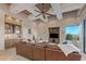 Spacious living area with a cozy fireplace and large windows at 9025 N Flying Butte --, Fountain Hills, AZ 85268