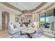 Living room features a large sectional sofa and coffee table at 9025 N Flying Butte --, Fountain Hills, AZ 85268
