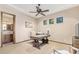Home office with built-in desk and ceiling fan at 9025 N Flying Butte --, Fountain Hills, AZ 85268