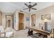 Home office with wood desk, ceiling fan, and views at 9025 N Flying Butte --, Fountain Hills, AZ 85268