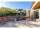 Relaxing patio area with seating and a stone fireplace at 9025 N Flying Butte --, Fountain Hills, AZ 85268