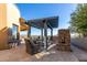 Patio features a pergola, fireplace, and comfortable seating at 9025 N Flying Butte --, Fountain Hills, AZ 85268
