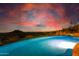 Expansive infinity pool with city views at sunset at 9025 N Flying Butte --, Fountain Hills, AZ 85268