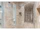 Walk-in shower with tiled walls and built-in seat at 9025 N Flying Butte --, Fountain Hills, AZ 85268