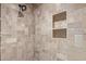 Shower with beige tile and built-in shelves at 9025 N Flying Butte --, Fountain Hills, AZ 85268
