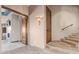 Tiled staircase with wooden doors and wall sconces at 9025 N Flying Butte --, Fountain Hills, AZ 85268