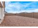 A spacious dirt backyard enclosed by a block wall, waiting for landscaping opportunities at 18795 E Elizar Dr, Gold Canyon, AZ 85118