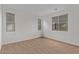 Bright bedroom with large windows and neutral carpet at 18795 E Elizar Dr, Gold Canyon, AZ 85118